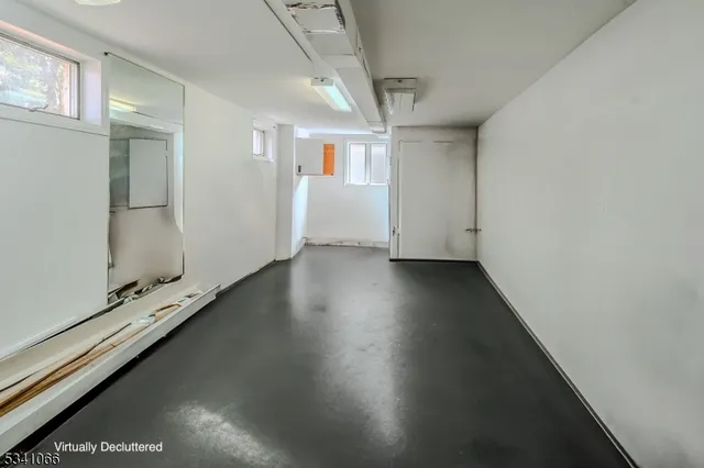 a view of a livingroom with wooden floor