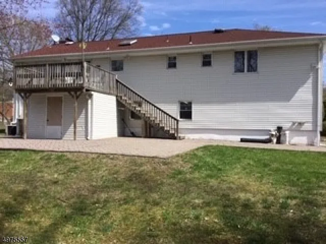 a view of a house with a garden