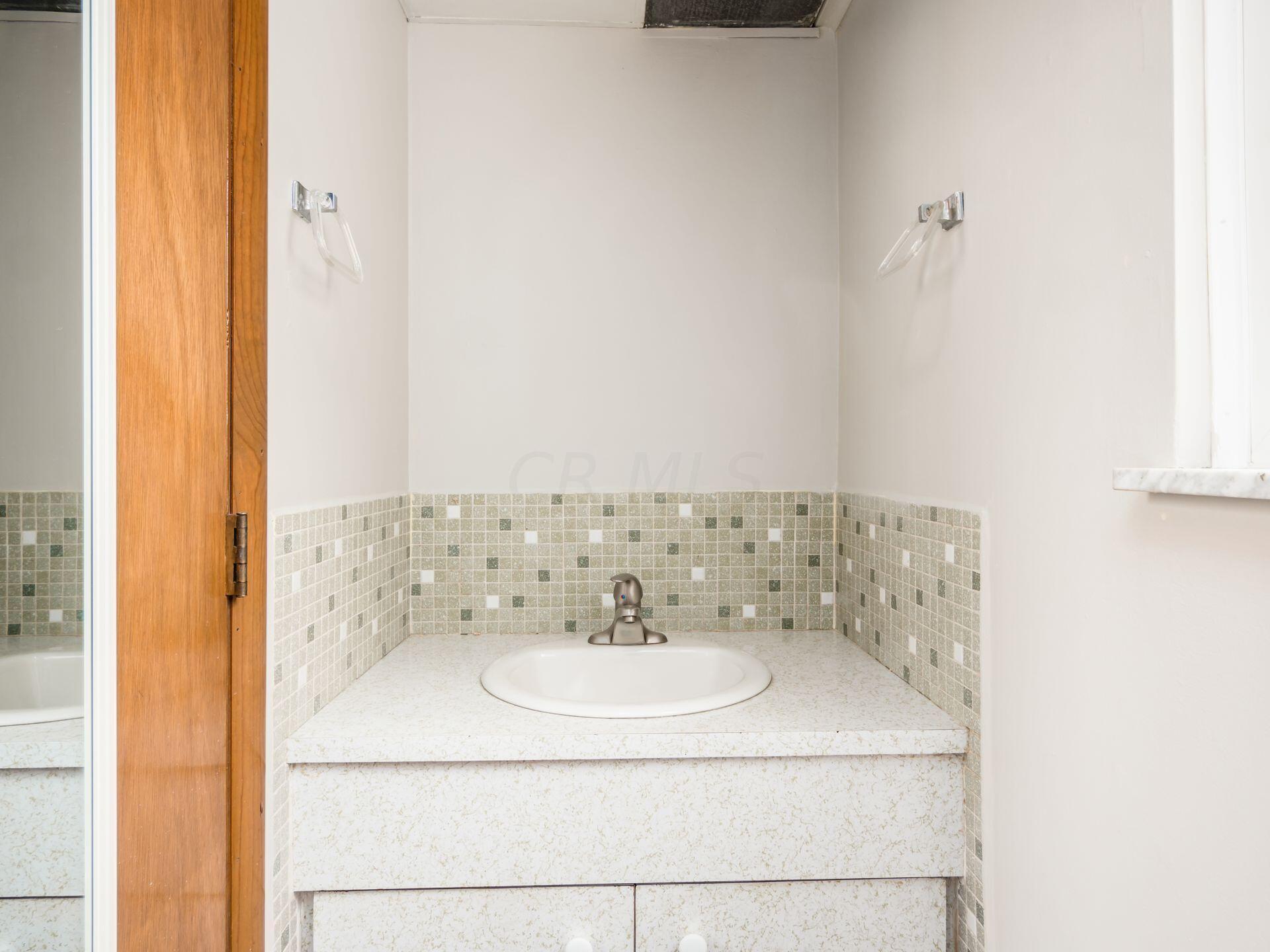 1591 Fall Brook Road Columbus, OH 43223 - Photo 23 of 32 Half Bath