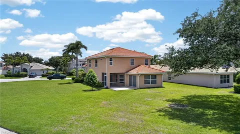 an aerial view of a houses with outdoor space