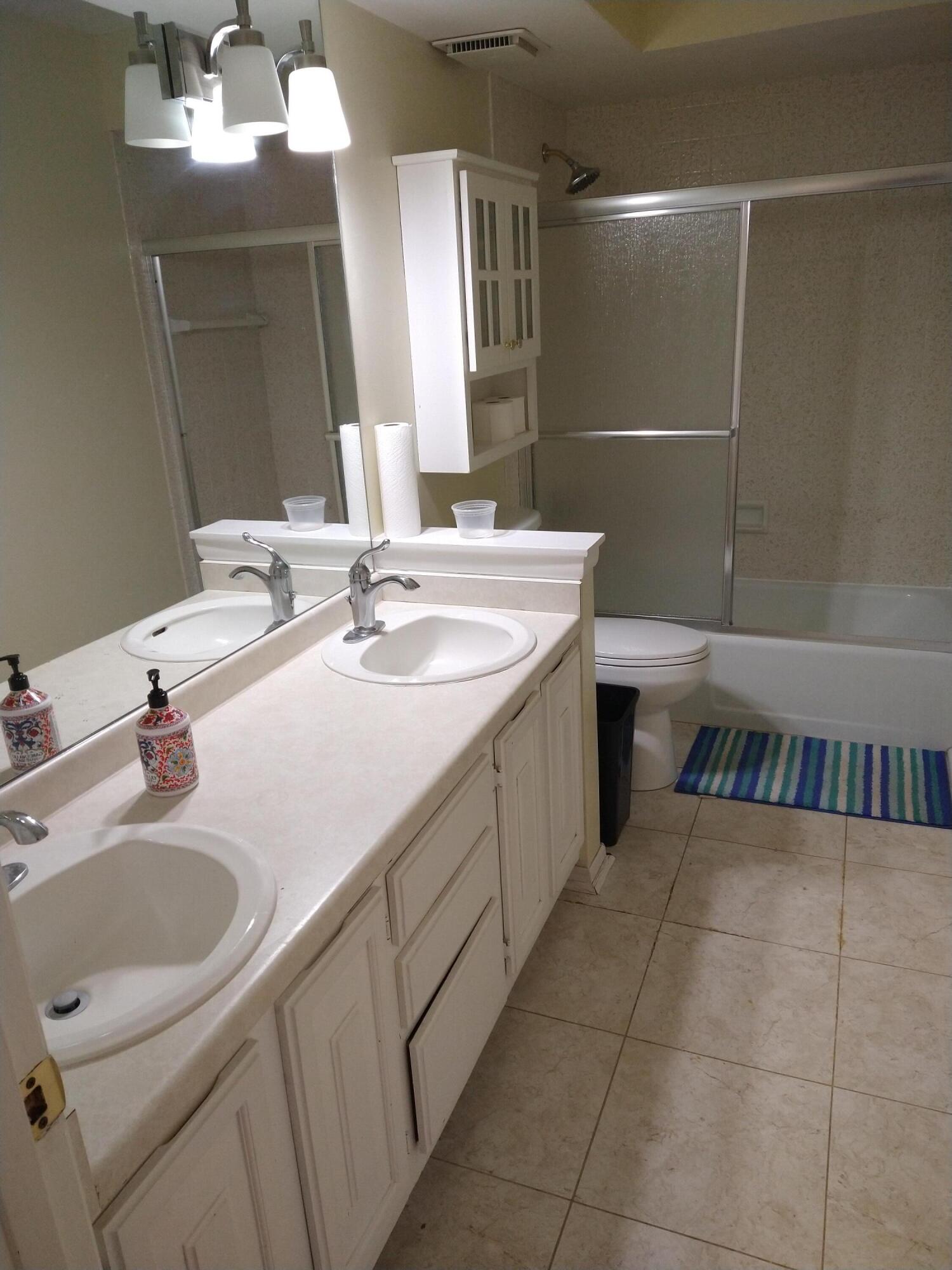 20245 Independence Drive, Unit B Brookfield, WI 53045 - Photo 13 of 23 hallway full bathroom two sinks indpende