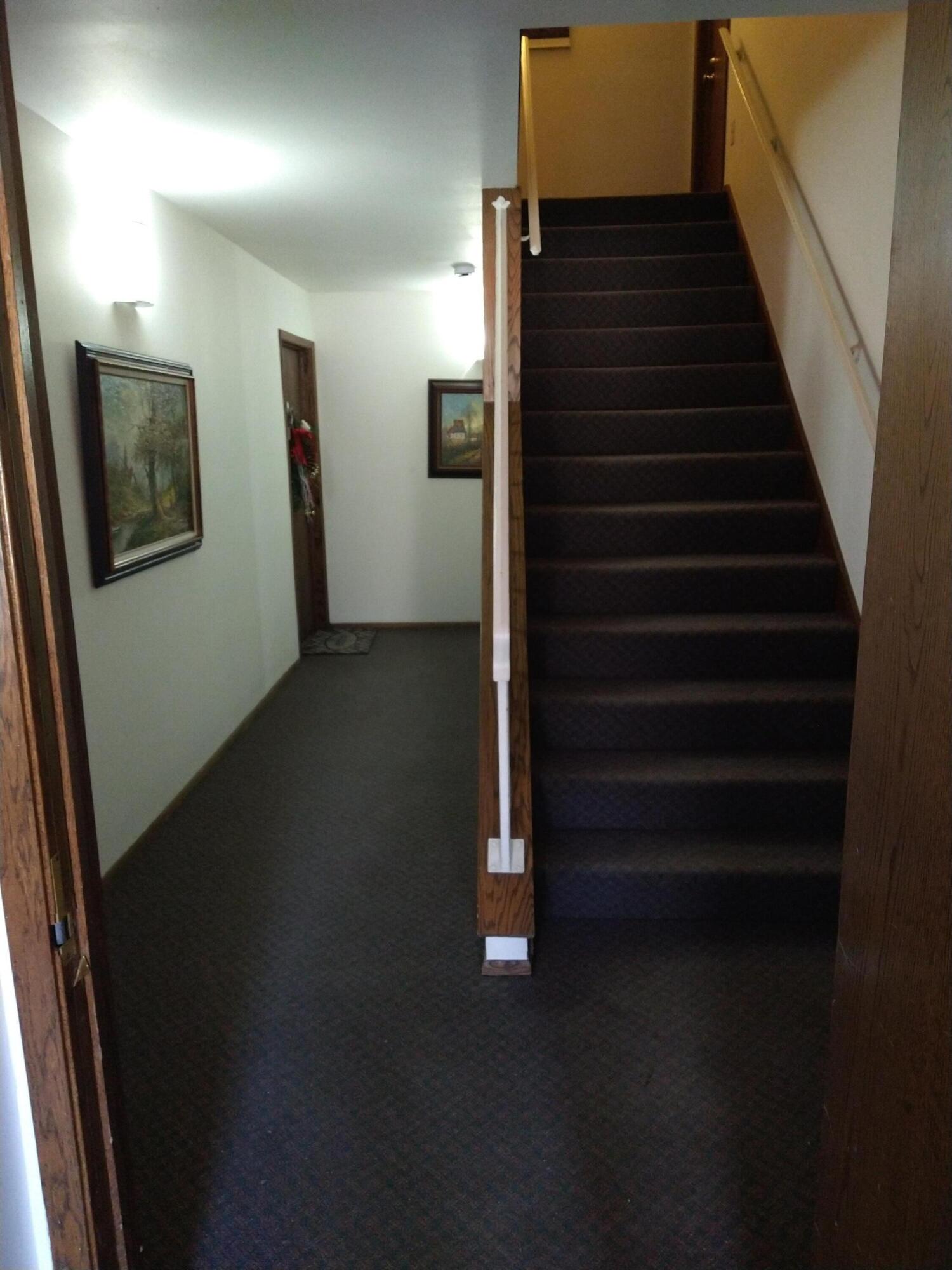 20245 Independence Drive, Unit B Brookfield, WI 53045 - Photo 19 of 23 inside front entrance hallway to condo i