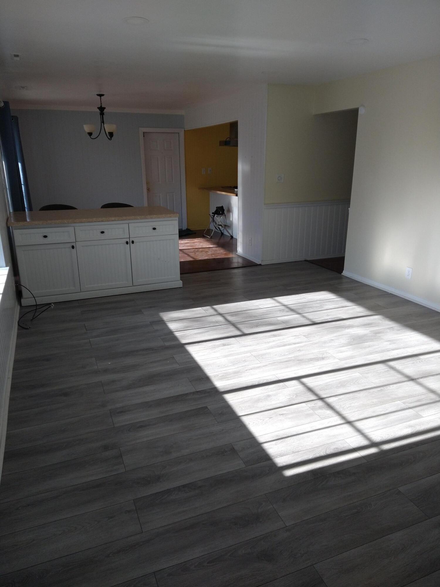 20245 Independence Drive, Unit B Brookfield, WI 53045 - Photo 6 of 23 living room looking toward kitchen and g