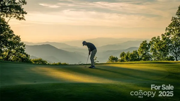 a view of a lake with a big yard