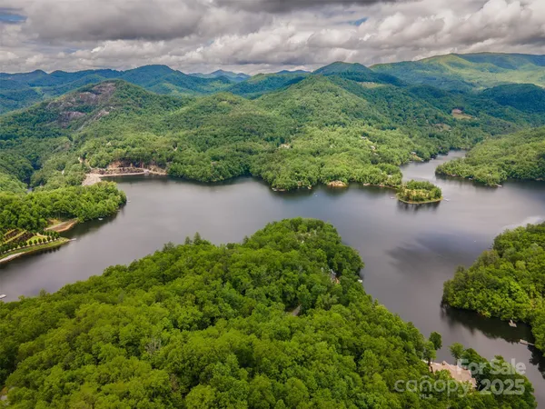 an aerial view of a houses with outdoor space and street view