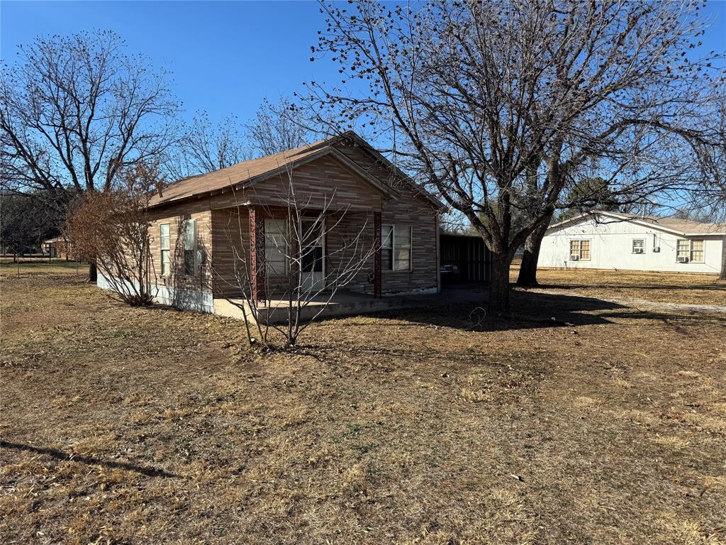 610 5th Street Hawley, TX 79525 - Photo 19 of 19 a view of a house with a yard covered in snow