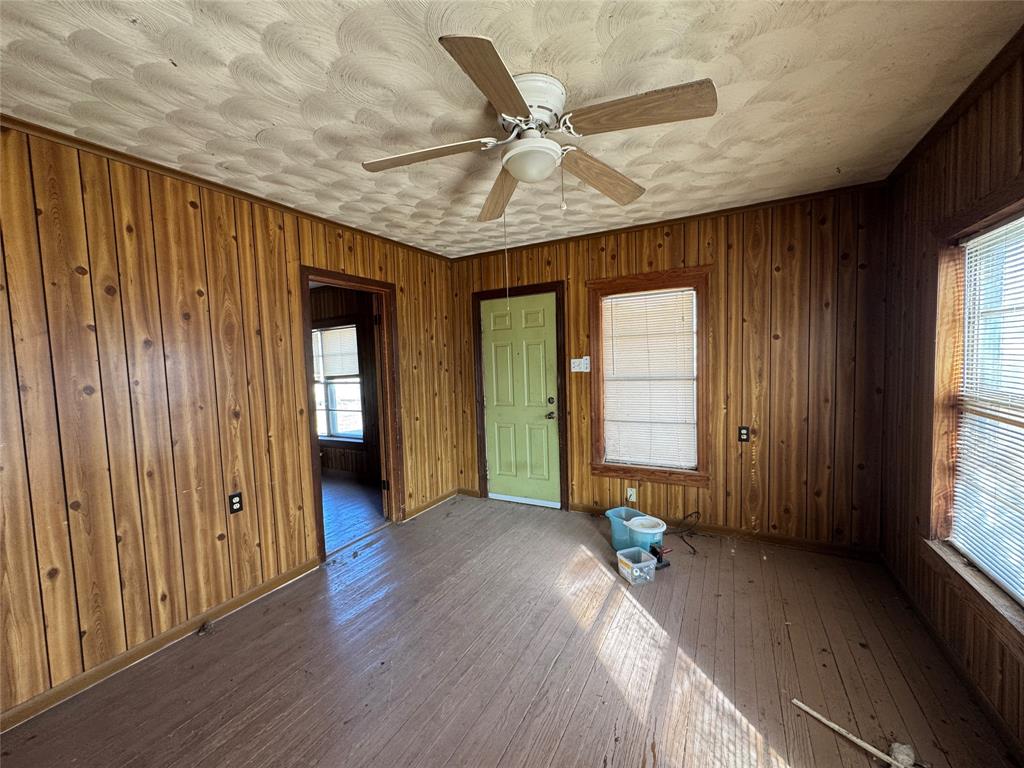 610 5th Street Hawley, TX 79525 - Photo 3 of 19 a view of an entryway with wooden floor