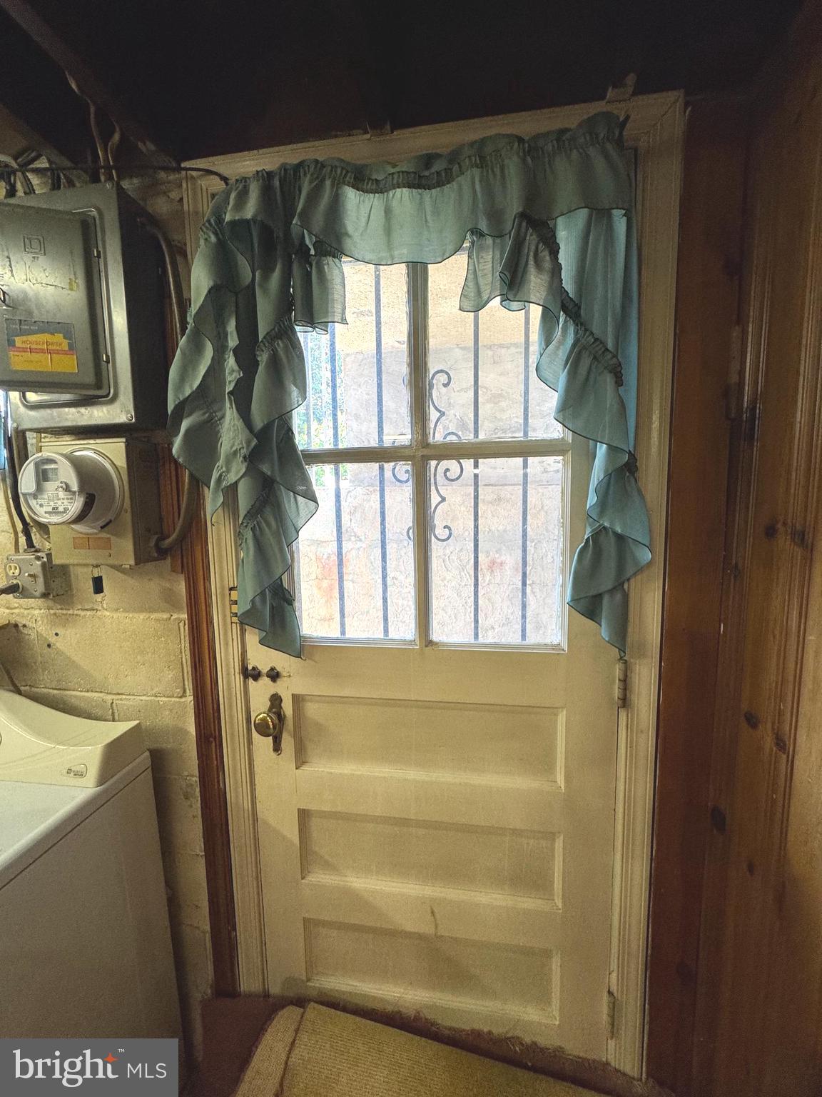 1525 Clairidge Road Baltimore, MD 21207 - Photo 36 of 44 Basement with Exit door