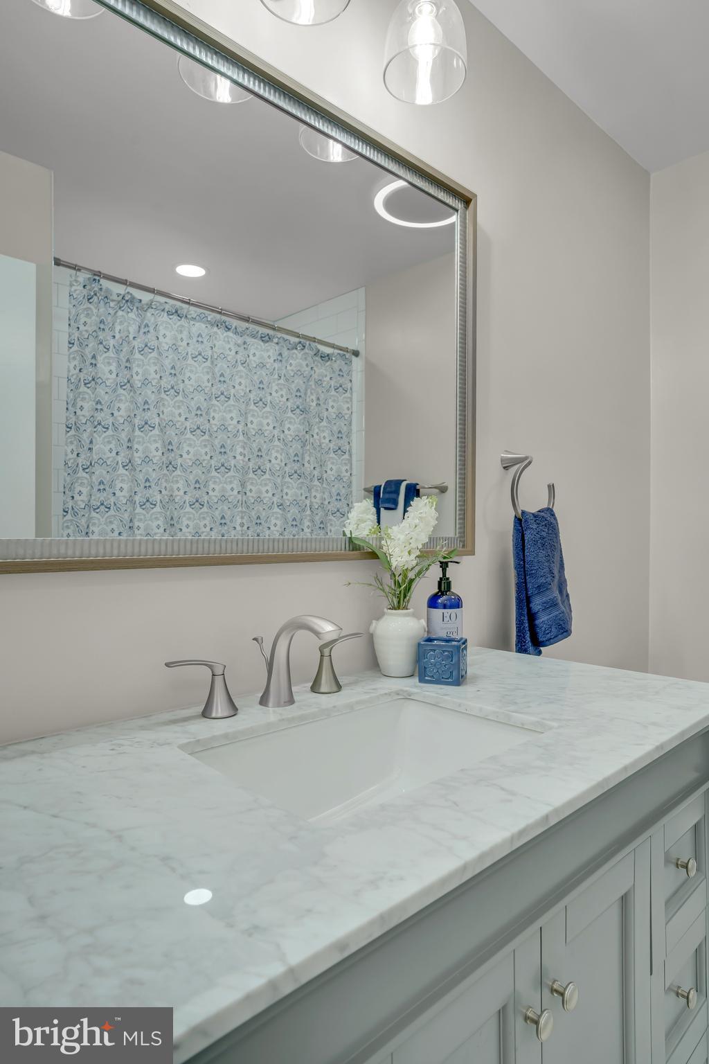 1929 Hull Road Vienna, VA 22182 - Photo 23 of 59 Main level guest bathMain level primary bedroom