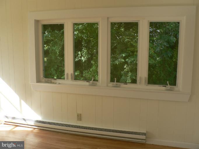7423 Station Road Newcomb, MD 21653 - Photo 12 of 17 a view of a glass door and a window