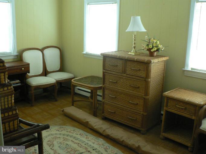 7423 Station Road Newcomb, MD 21653 - Photo 4 of 17 a living room with furniture and a window