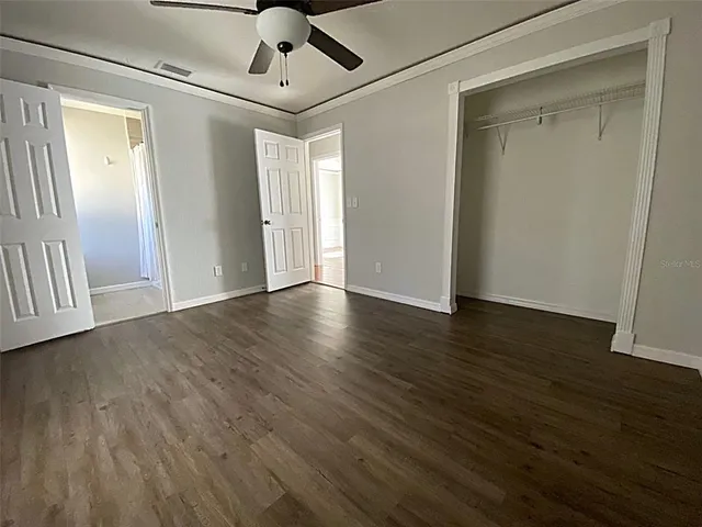 a bathroom with a shower and a toilet