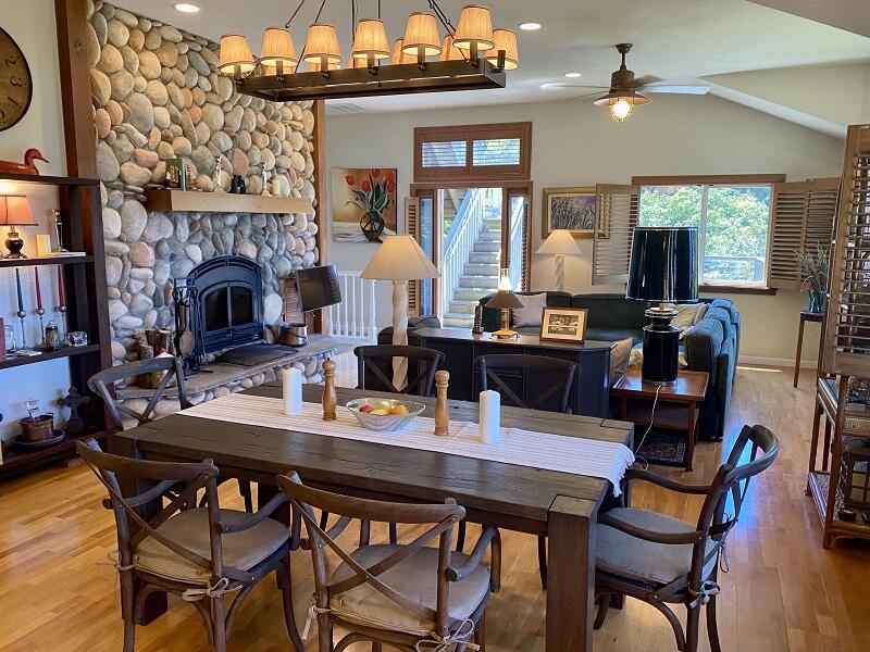 1050 Spring Road Shelter Cove, CA 95589 - Photo 4 of 42 a view of a dining room with furniture and chandelier