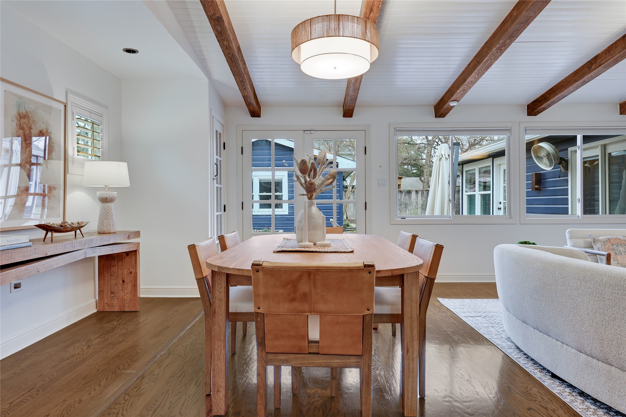 2908 Perry Lane Austin, TX 78731 - Photo 14 of 37 a view of a dining room with furniture window and wooden floor