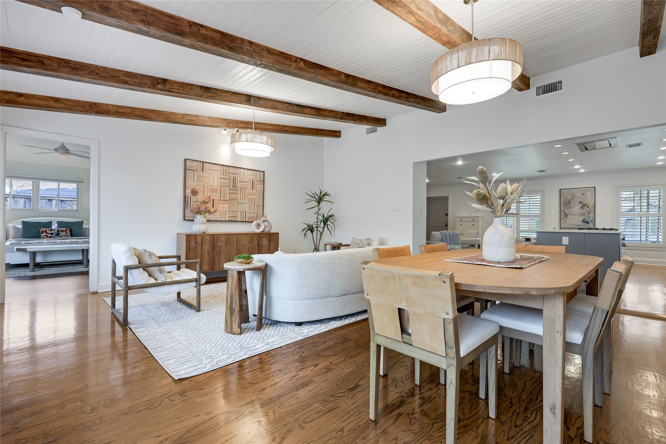 2908 Perry Lane Austin, TX 78731 - Photo 16 of 37 a view of a dining room with furniture and wooden floor