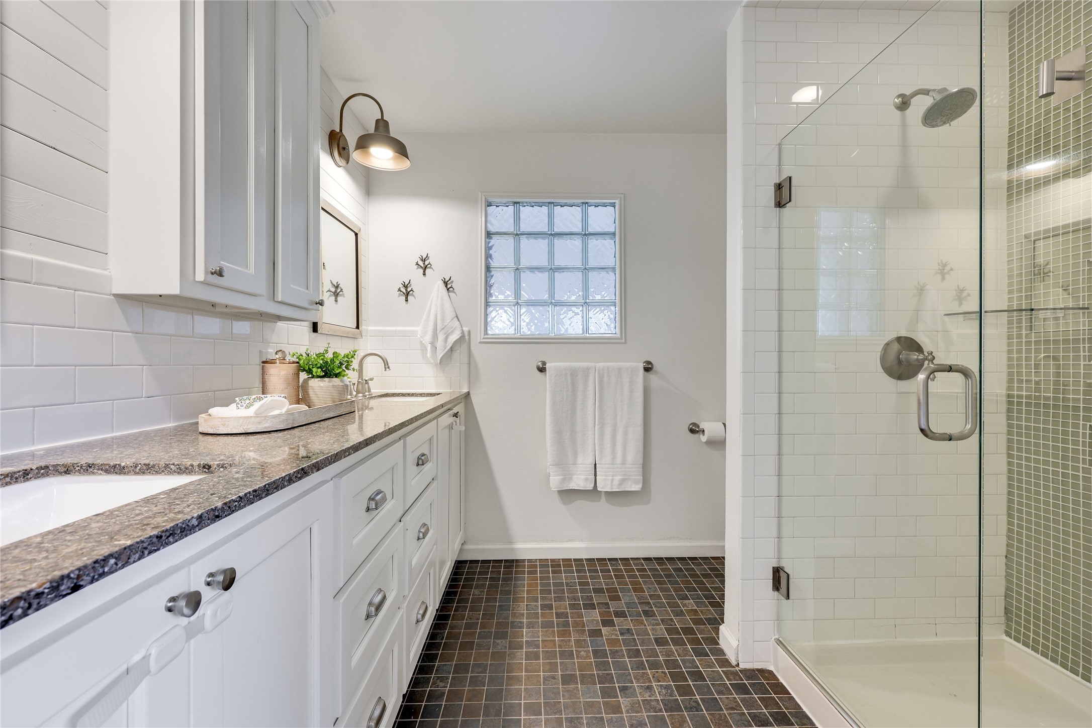 2908 Perry Lane Austin, TX 78731 - Photo 20 of 37 a bathroom with a granite countertop sink a toilet and shower