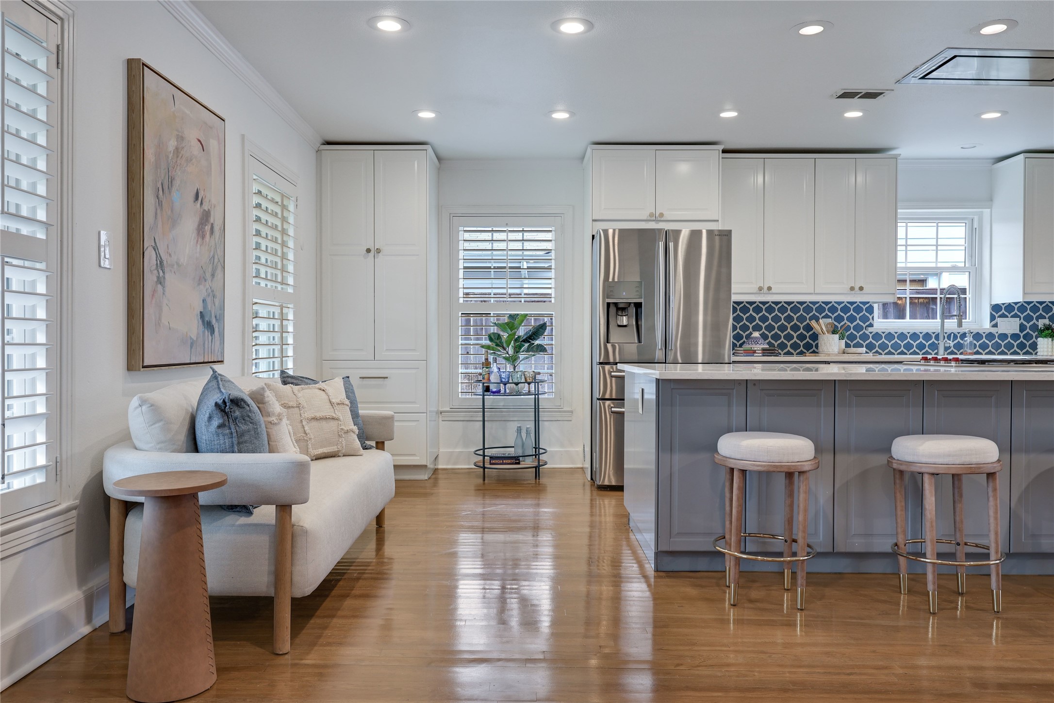 2908 Perry Lane Austin, TX 78731 - Photo 9 of 37 a kitchen with stainless steel appliances granite countertop a stove a sink and a refrigerator