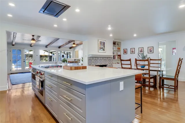 a view of kitchen with cabinets and wooden floor