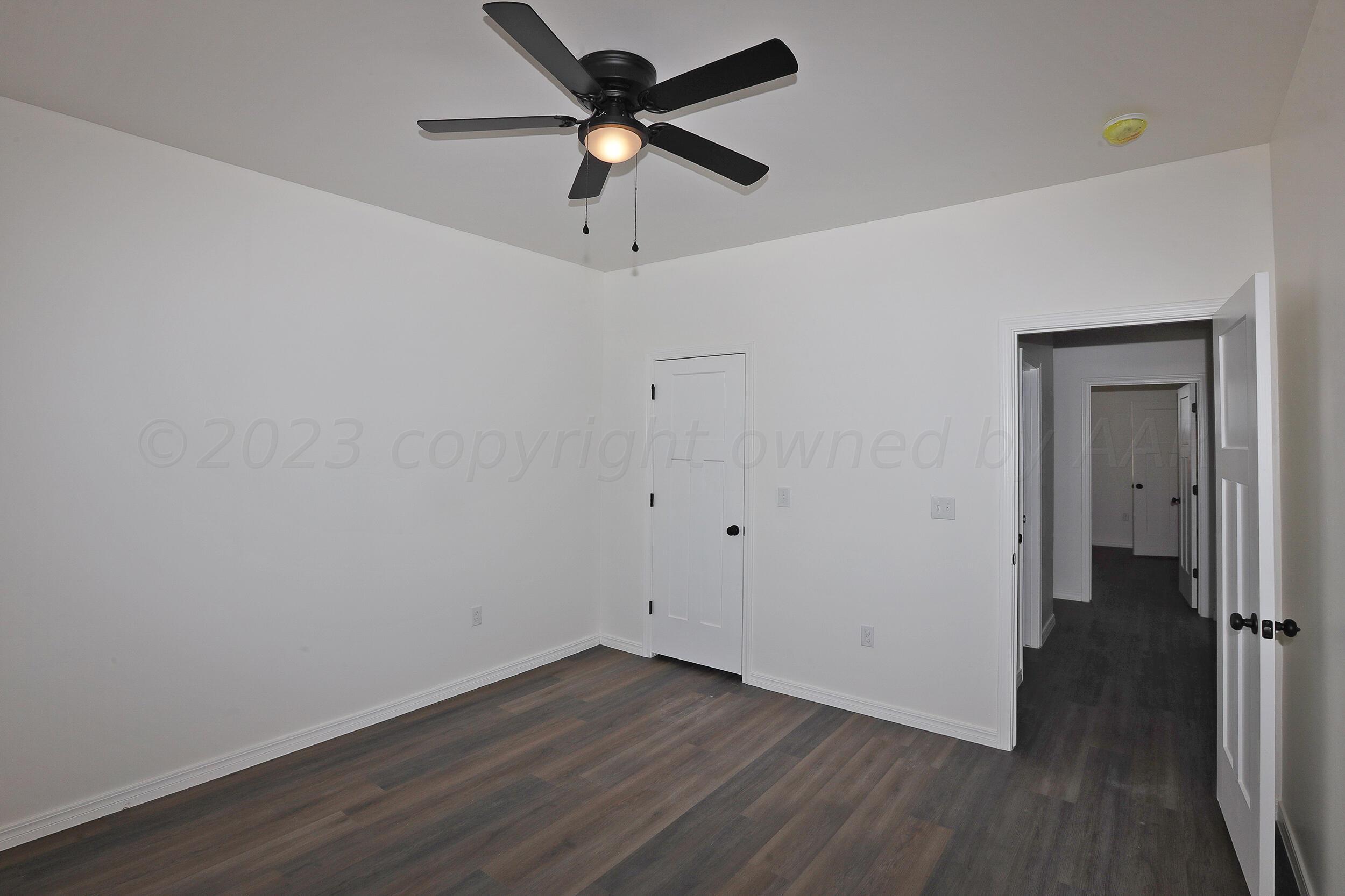 13771 Periwinkle Drive Amarillo, TX 79119 - Photo 16 of 23 wooden floor in an empty room
