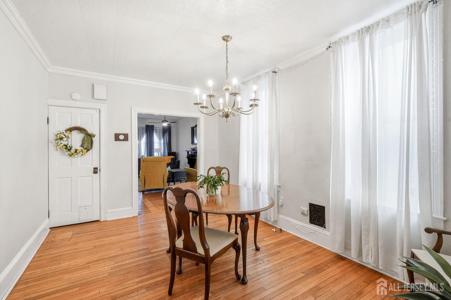 346 East Union Street Burlington, NJ 08016 - Photo 14 of 48 a view of a dining room with furniture and chandelier