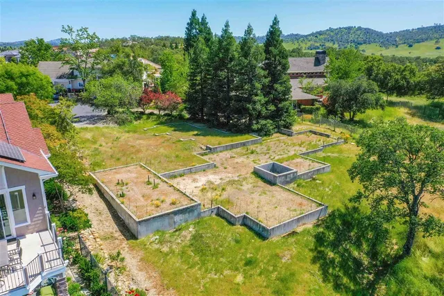 swimming pool with trees in the background