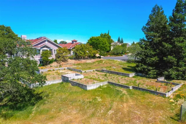 a view of a yard with an outdoor space and seating area