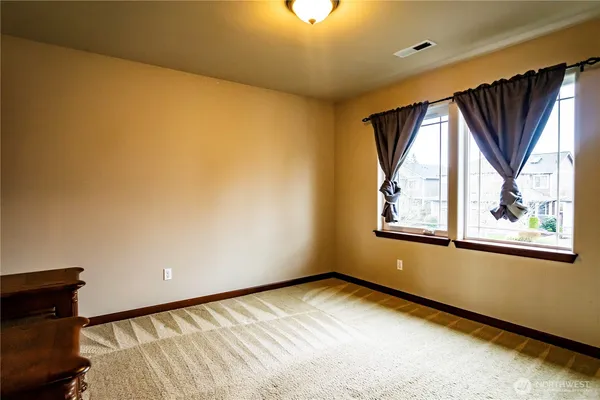 a view of a bedroom with closet area