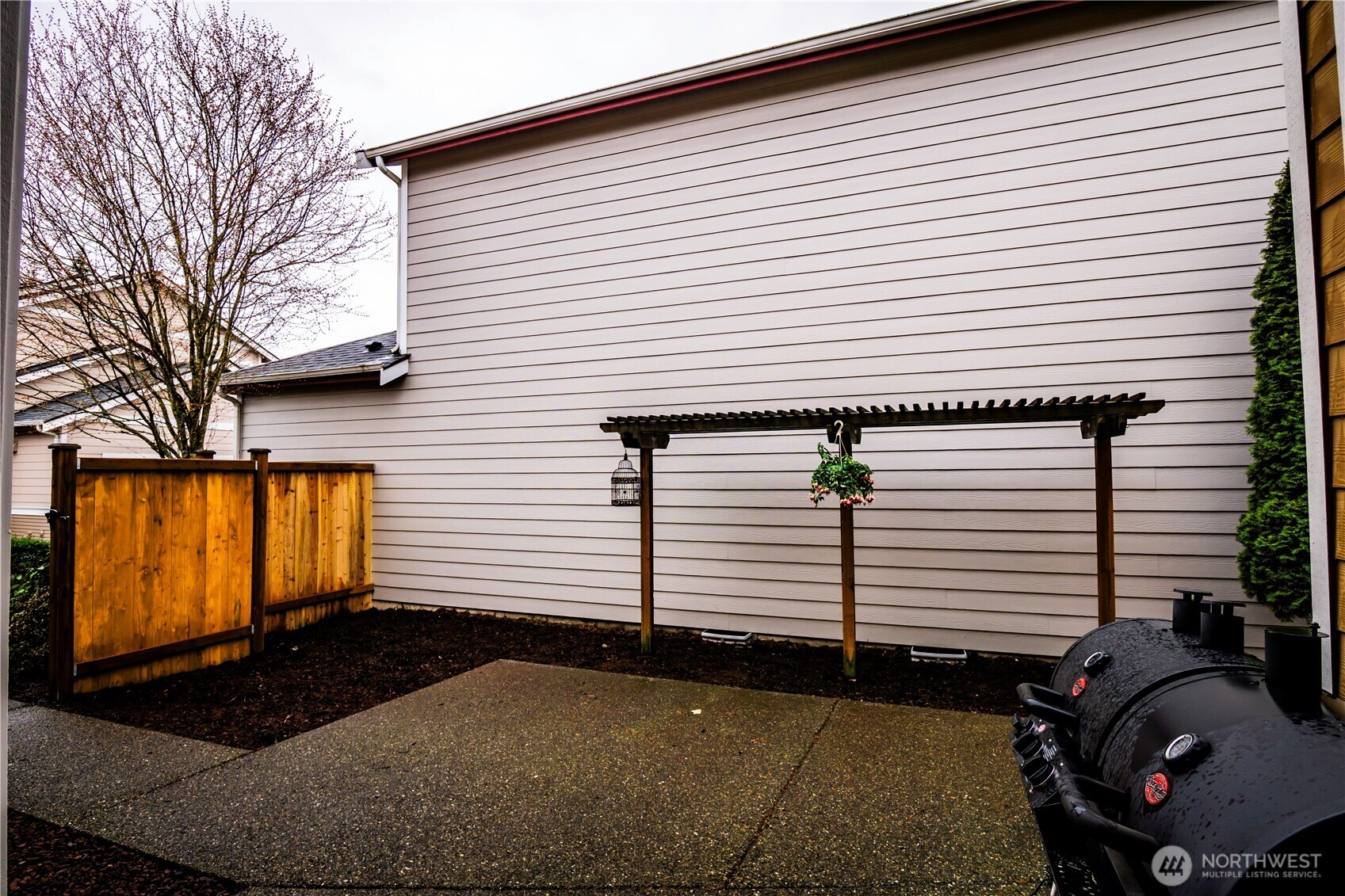 4646 Rochelle Street Southeast Lacey, WA 98503 - Photo 24 of 31 a view of a back side of house