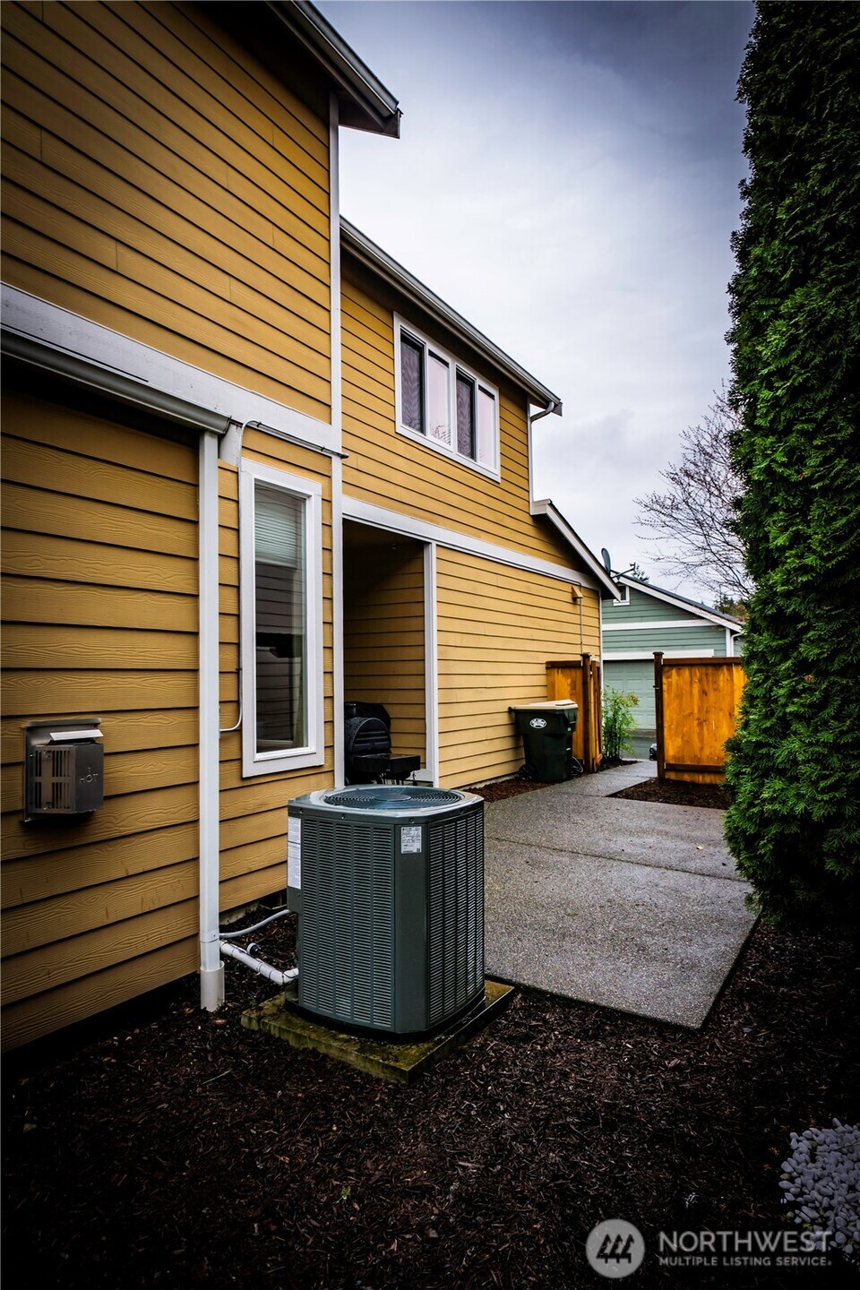 4646 Rochelle Street Southeast Lacey, WA 98503 - Photo 27 of 31 a view of a house with a yard