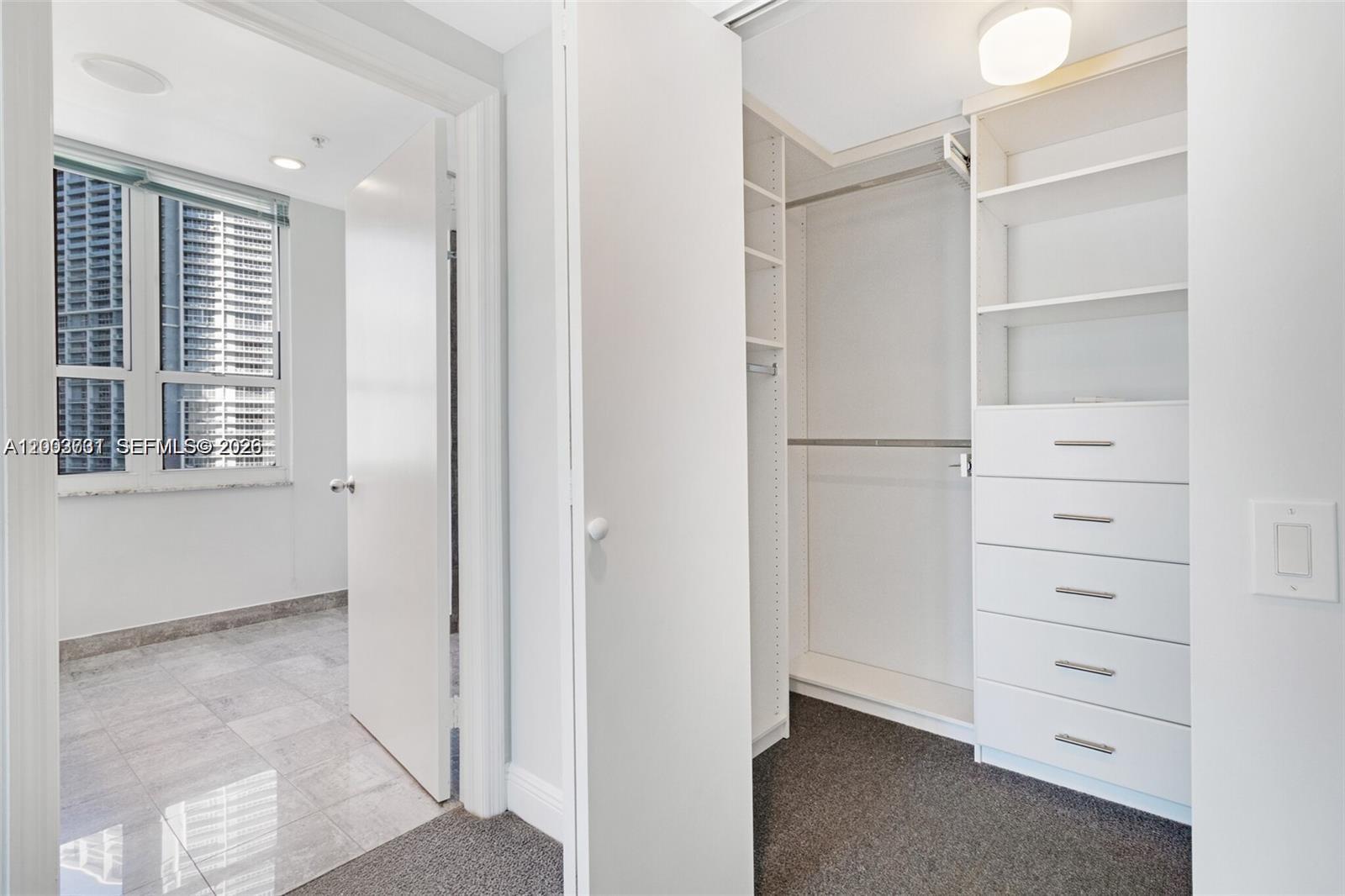 701 Brickell Key Boulevard, Unit 2103 Miami, FL 33131 - Photo 28 of 48 BUILT IN CLOSET