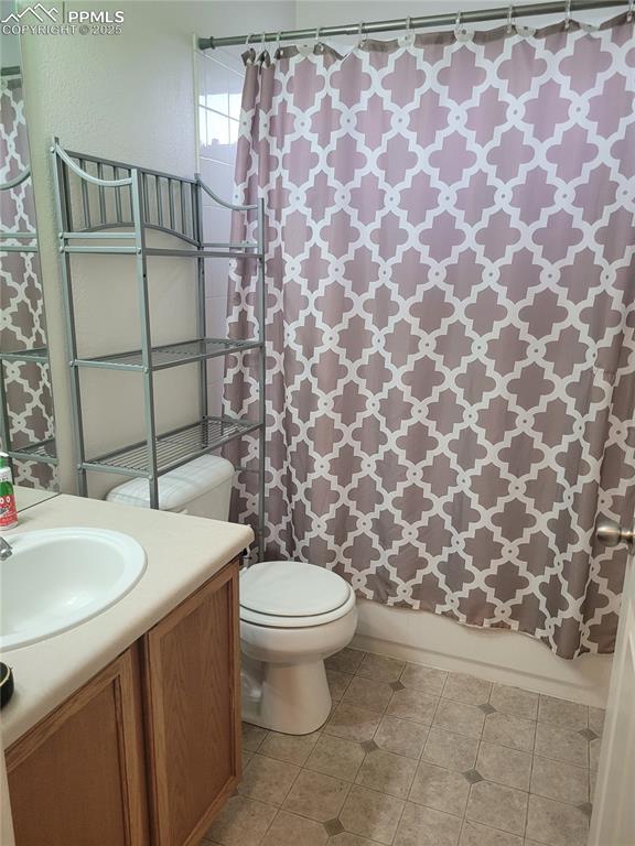8975 Kingston Heath Road Peyton, CO 80831 - Photo 10 of 18 a bathroom with a sink and a toilet