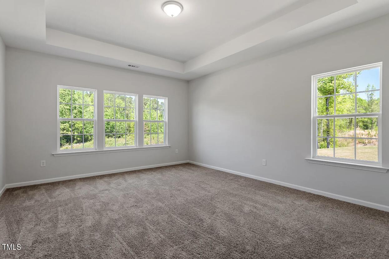 73 Beech Tree Way, Unit 138 Garner, NC 27529 - Photo 13 of 24 Primary Bedroom