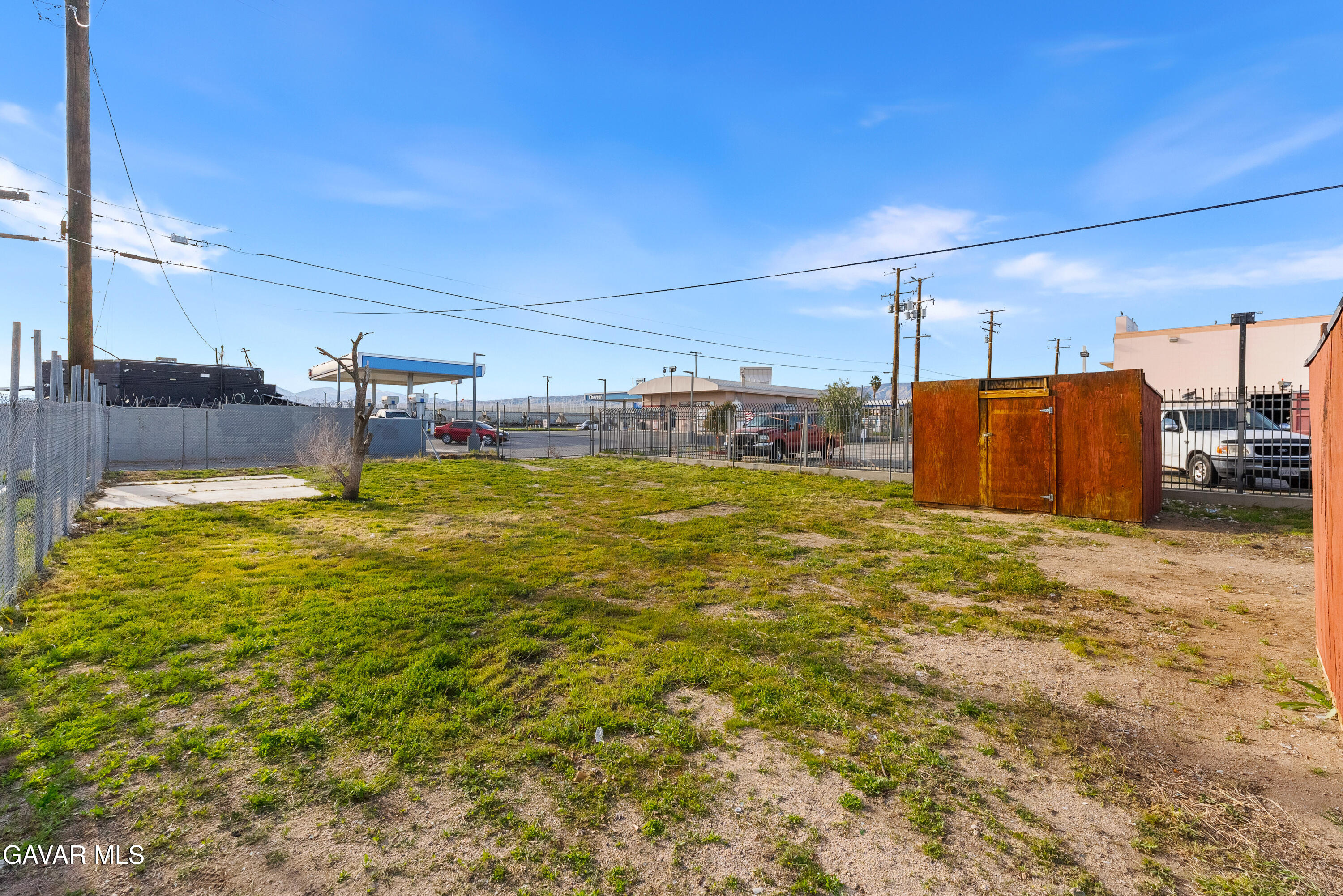 15733 K Street Mojave, CA 93501 - Photo 33 of 38 a swimming pool with an outdoor space and seating area