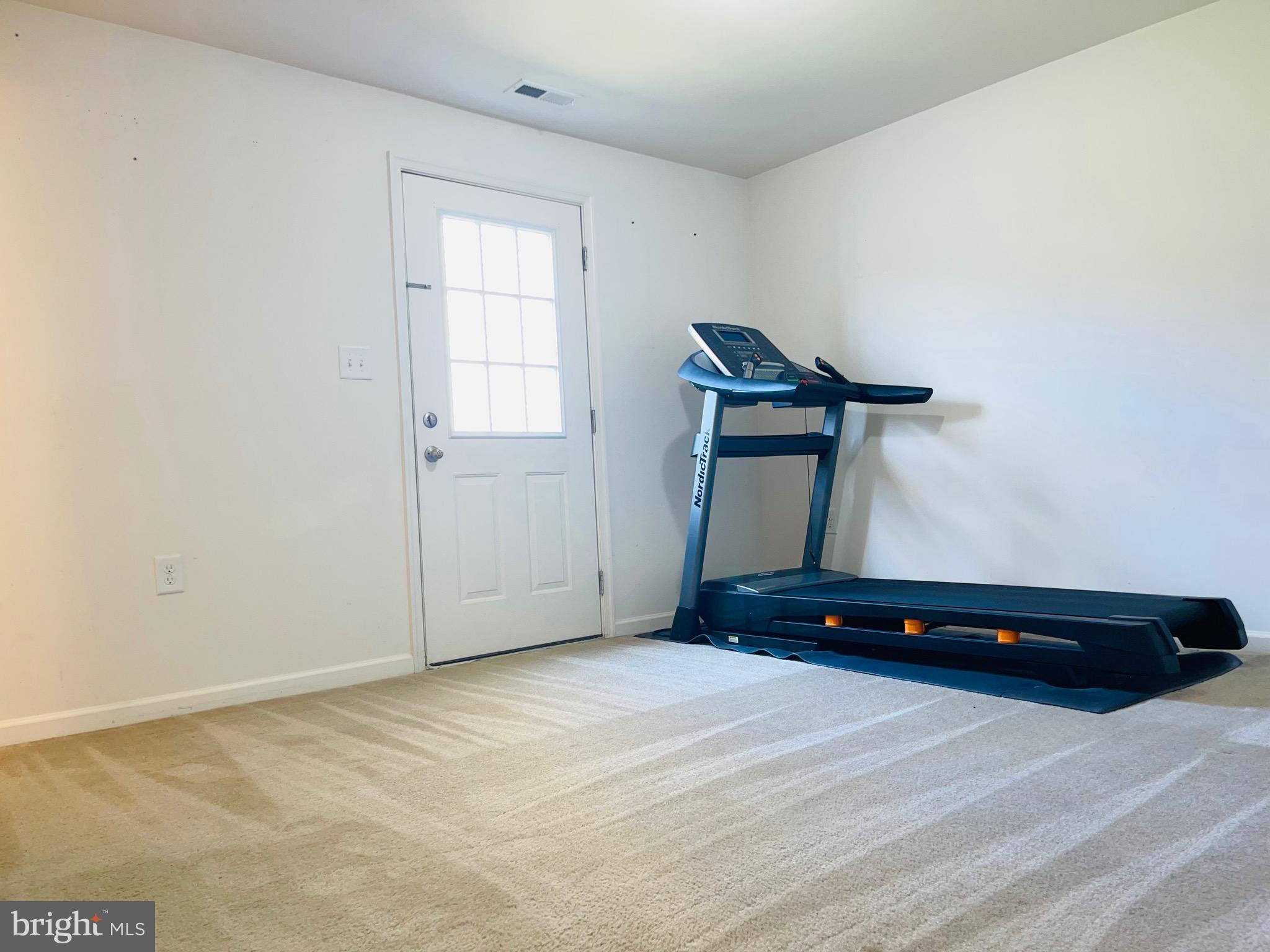 1149 Steed Street Ranson, WV 25438 - Photo 15 of 16 Basement rec room with walkout basement