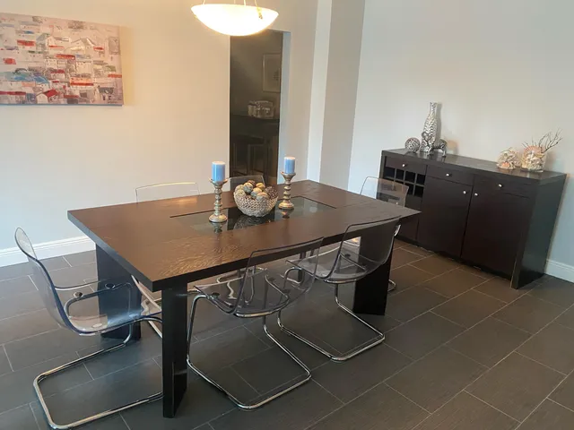 a view of a dining room with furniture