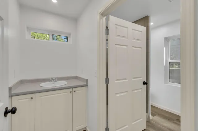 a view of a room that has a window in it