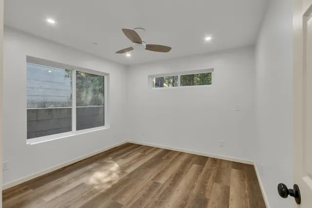 a bathroom with a bathtub and shower