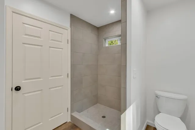 a view of an entryway with wooden floor