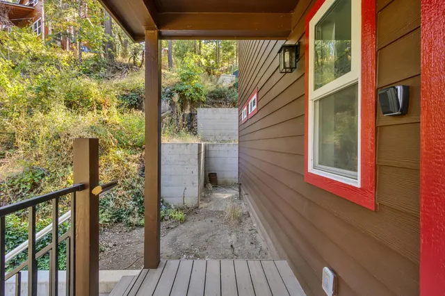 a view of a room with rack and white walls