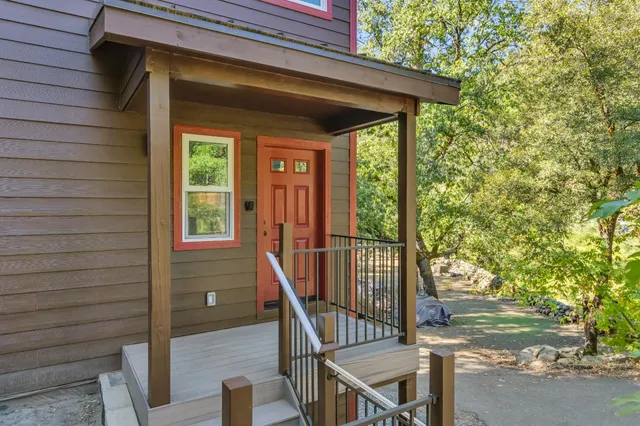 a view of a door and a window