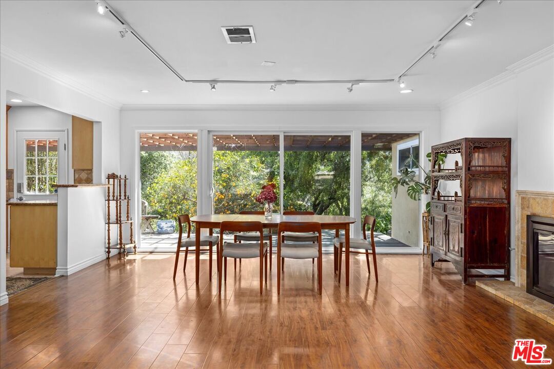 6867 Apperson Street Tujunga, CA 91042 - Photo 1 of 54 a dining room with furniture window and wooden floor