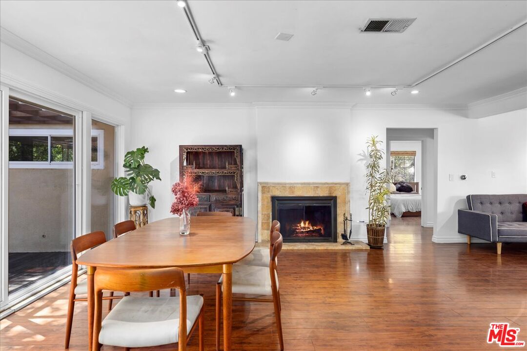 6867 Apperson Street Tujunga, CA 91042 - Photo 16 of 54 a living room with furniture and a fireplace