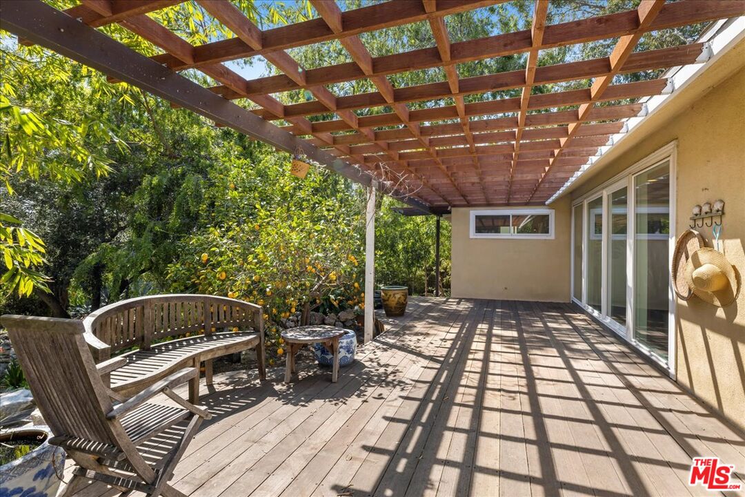 6867 Apperson Street Tujunga, CA 91042 - Photo 41 of 54 a view of a porch with furniture and yard