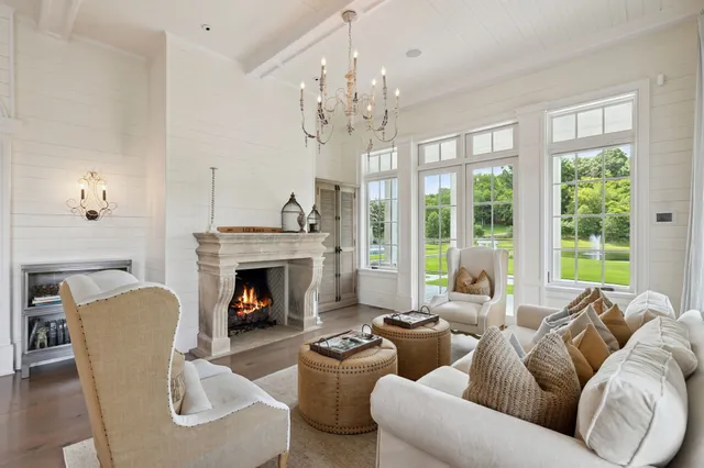a stove top oven sitting inside of a kitchen