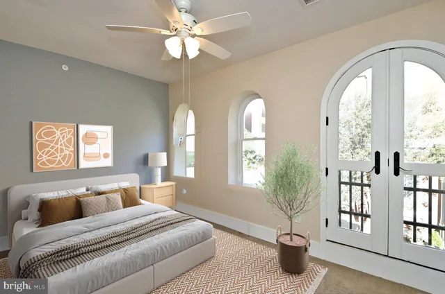 a view of a chairs and table in a backyard