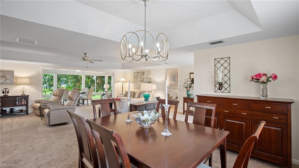 221 Quails Nest Road, Unit 4 Naples, FL 34112 - Photo 15 of 35 View of dining room looking towards living area.