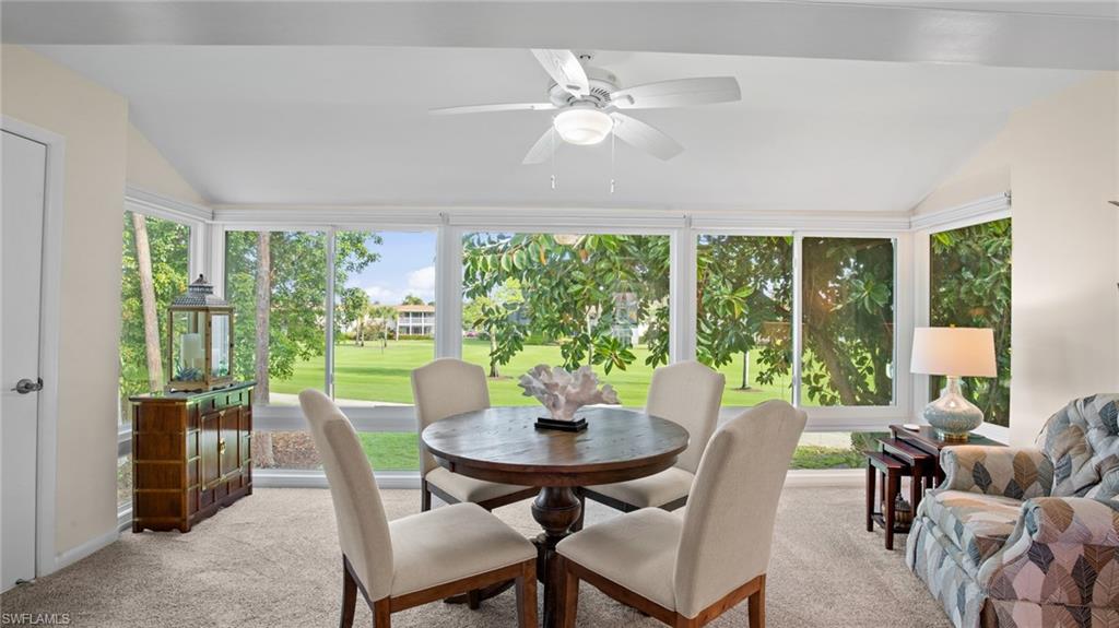 221 Quails Nest Road, Unit 4 Naples, FL 34112 - Photo 20 of 35 View looking out over 17th fairway from enclosed lanai.