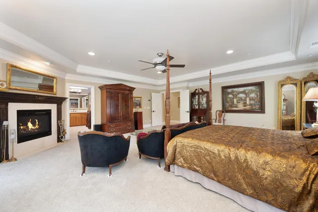 a view of a patio with table and chairs and potted plants