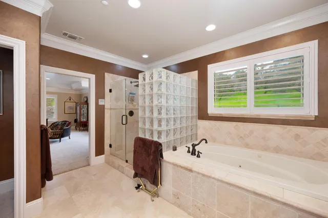 a front view of house and yard with swimming pool and trees