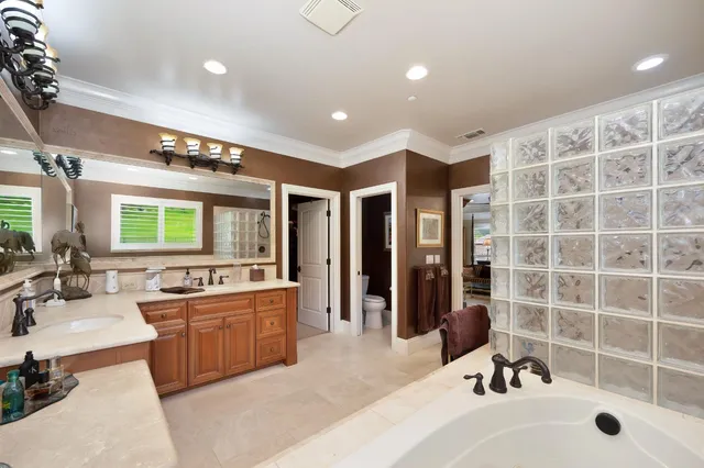 a view of a swimming pool with a patio